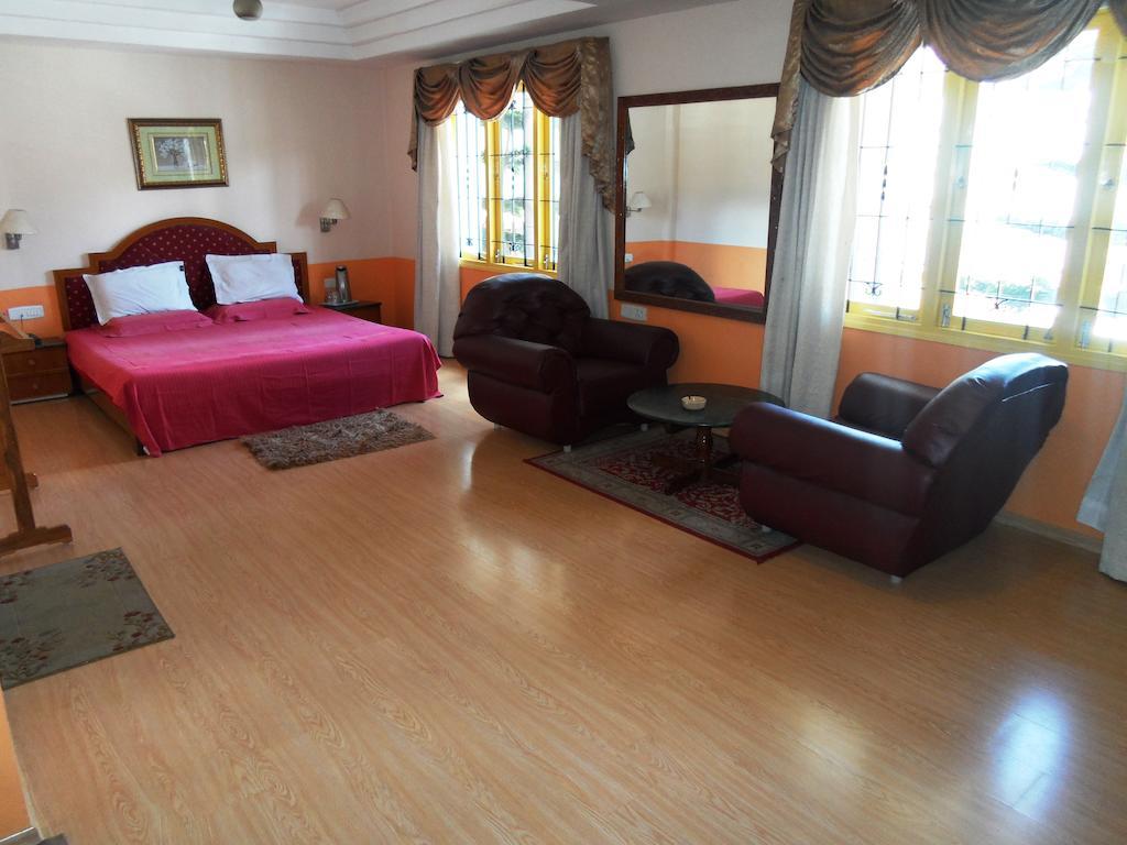 Hotel Grand Palace Kodaikanal Δωμάτιο φωτογραφία